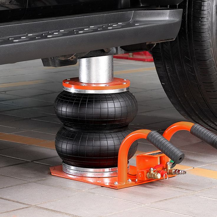 where to place car jack when changing tire