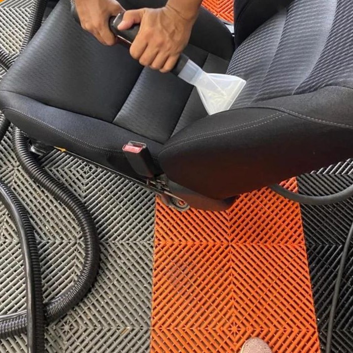 how to clean vomit from car