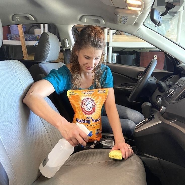 how to clean vomit from car