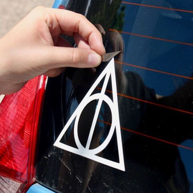 how to remove dealer decal from car