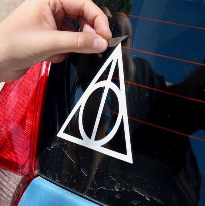 how to remove decal from car window